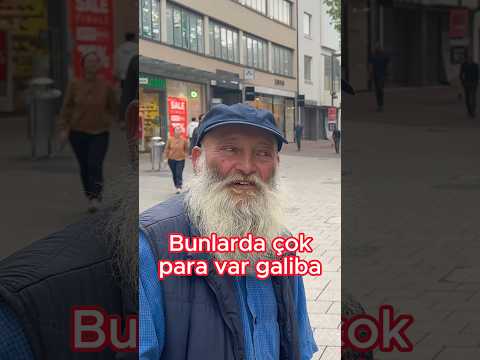 Alman dilenci kamerayı görünce..